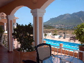 Covered terrace and mountain view