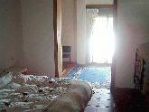 Bedroom with view towards terrace