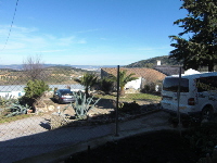 Partially renovated house and garden