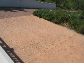 View down onto parking area from front terrace